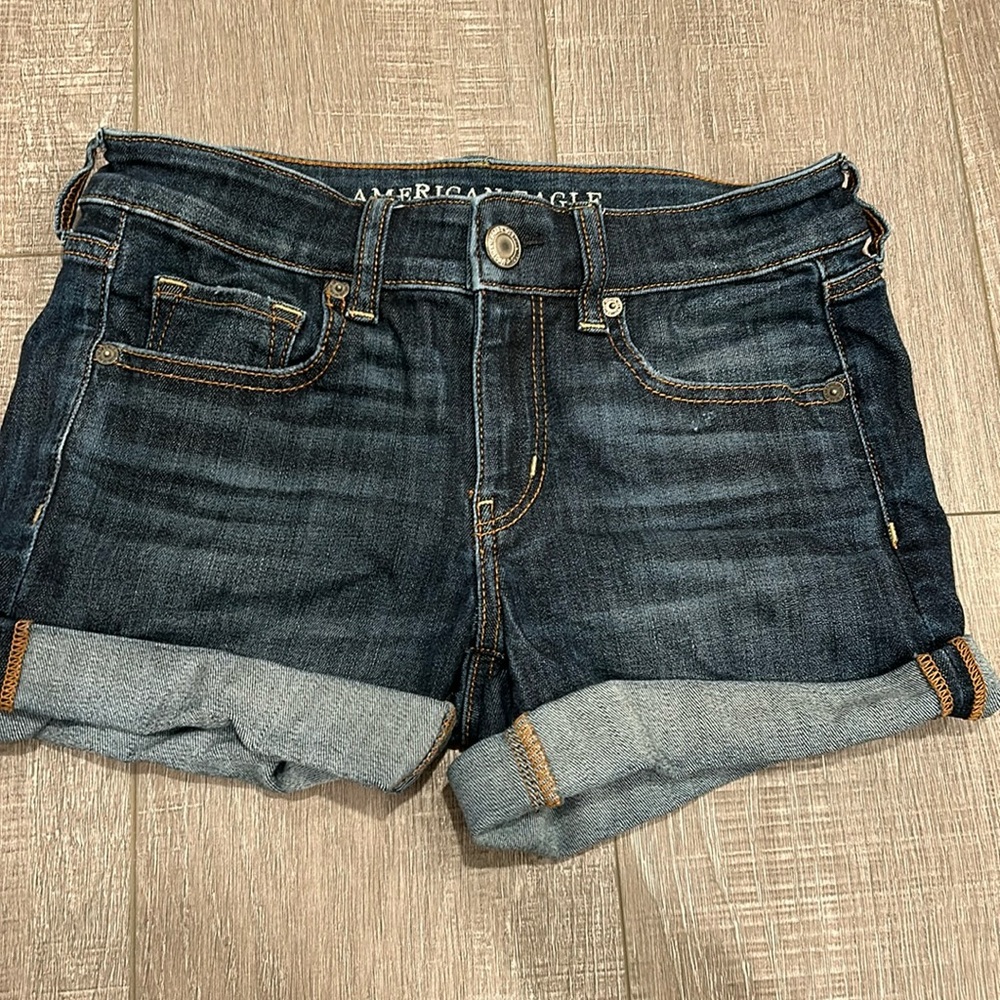 Dark blue rolled jean shorts